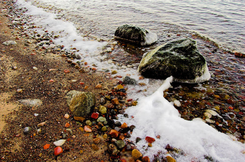 A picture of a shoreline with rocks